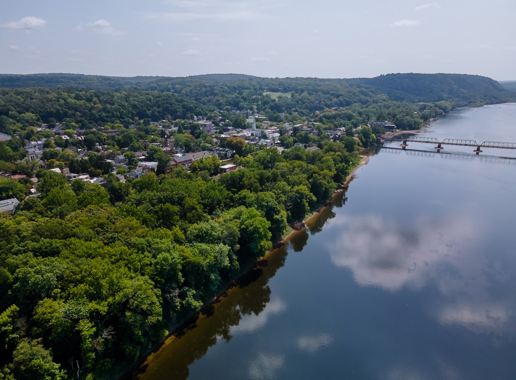 Aerial overhead of the Delaware river near small town historic New Hope, Pennsylvania.