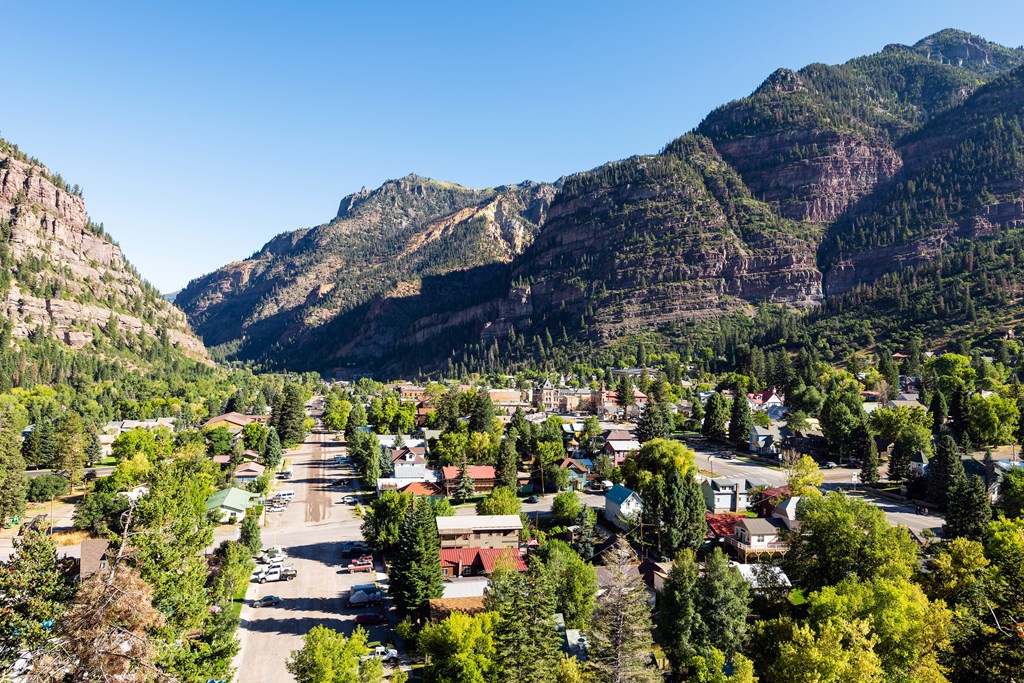 Ouray high angle aerial view of small town in Colorado with city main street.