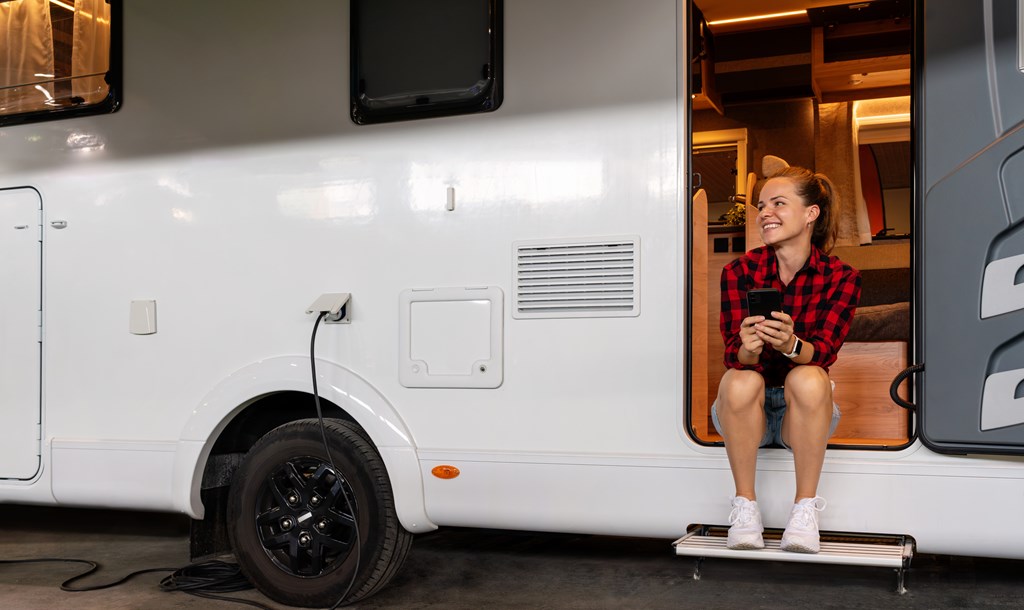 Woman sitting in her RV.