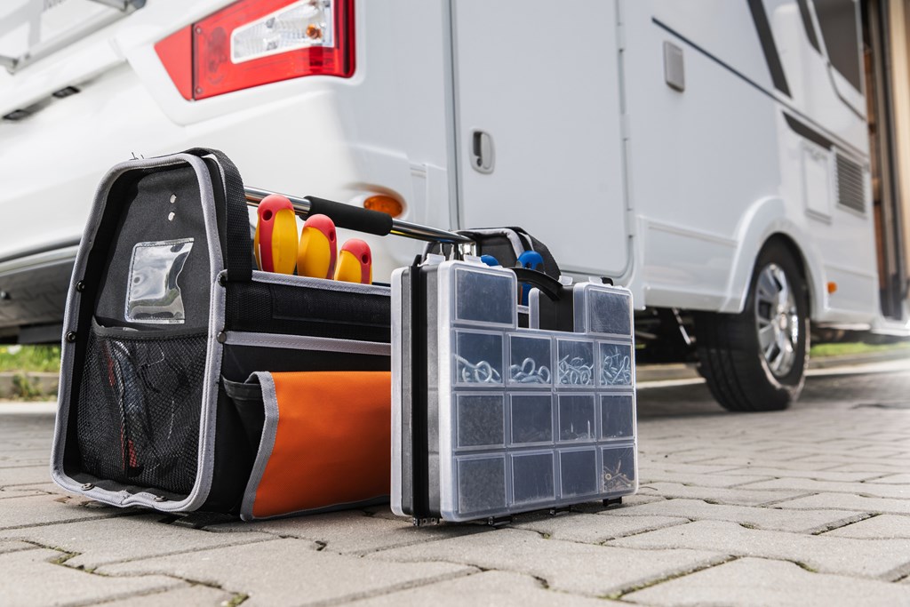 Closeup of toolbox next to an RV.