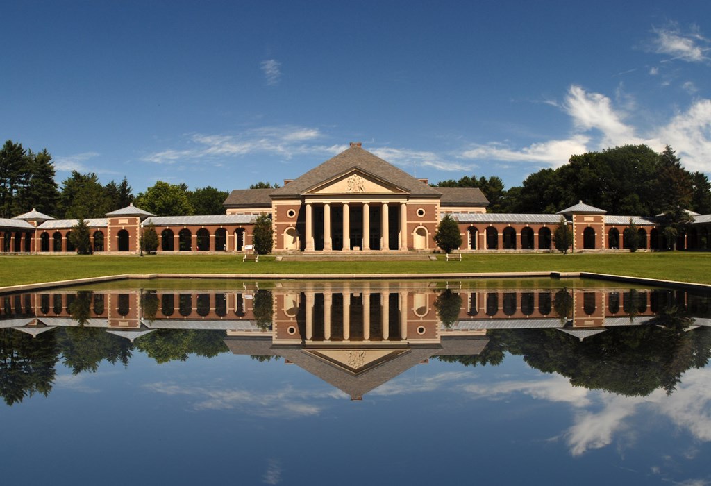 View of the historic Roosevelt Baths and Spa building and reflecting pool located in Saratoga Spa State Park.
