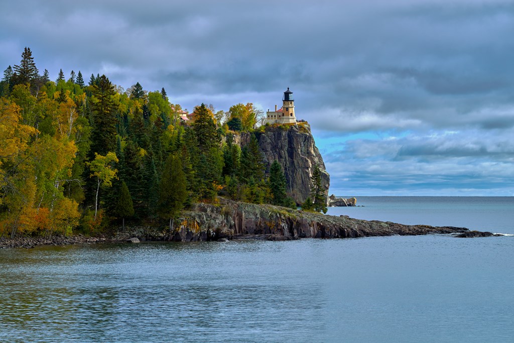 Split Rock Lighthouse towers over lake superior, from its 165 foot cliff, in northeastern Minnesota, early autumn.