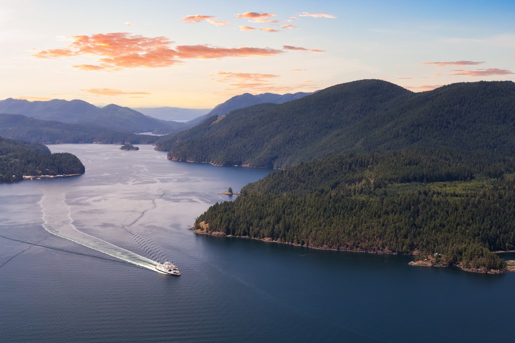 Aerial view of the Ferry traveling between the islands during a sunny summer evening.