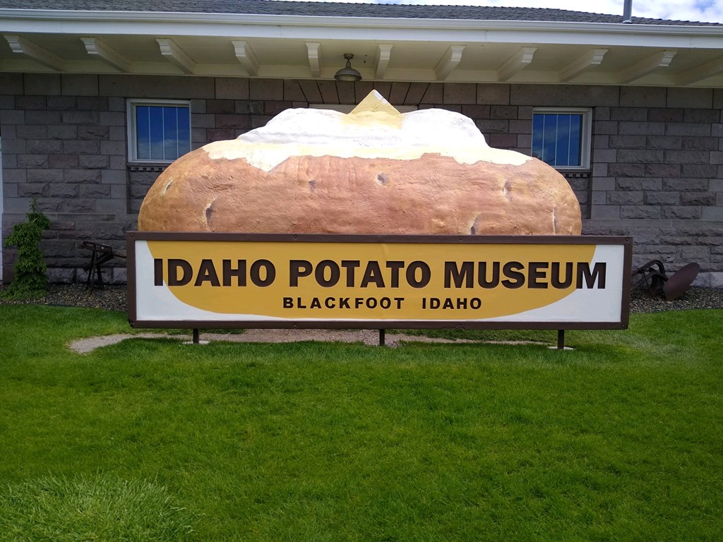 A larger-than-life baked potato statue sites outside the Idaho Potato Museum.