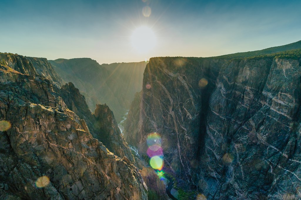 Giant wall of exposed marble in a canyon at sunset - Black Canyon of the Gunnison National Park.