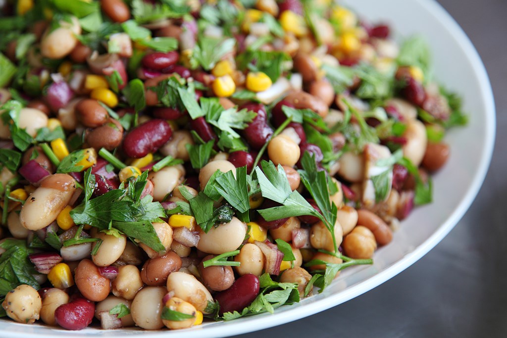 A buffet bowl of mixed bean salad.