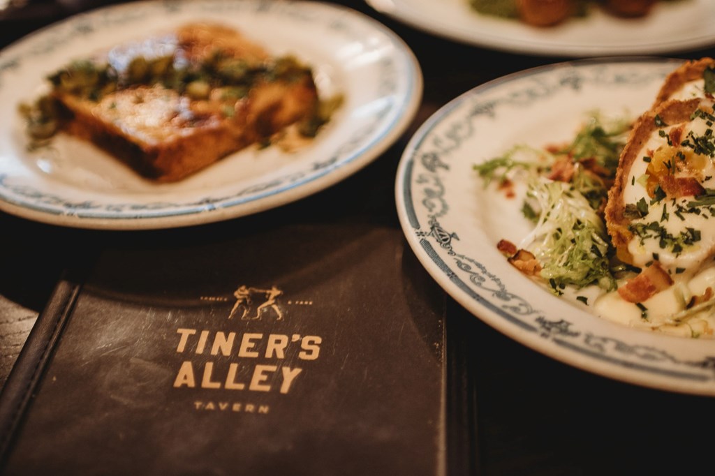 Two plates with a menu.