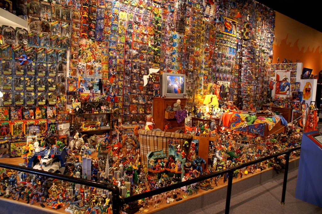 A wall-to-wall collection of action figures and toys at the Toy & Action Figure Museum.
