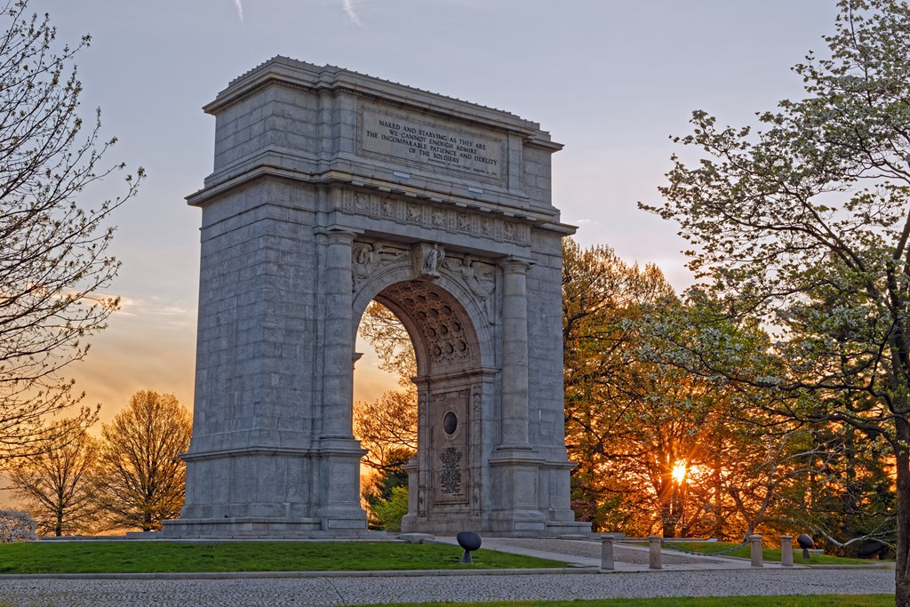 A springtime sunrise at Valley Forge National Historical Park in Pennsylvania, USA.The National Memorial Arch is a monument dedicated to George Washington and the United States Continental Army.