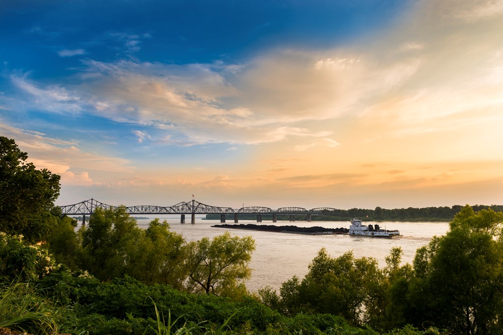 A pusher boat in the Mississippi River near the Vicksburg Bridge in Vicksburg, Mississippi, USA.