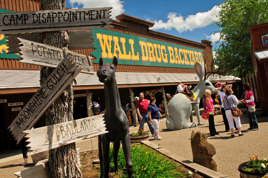 A western drug store with animal statues.