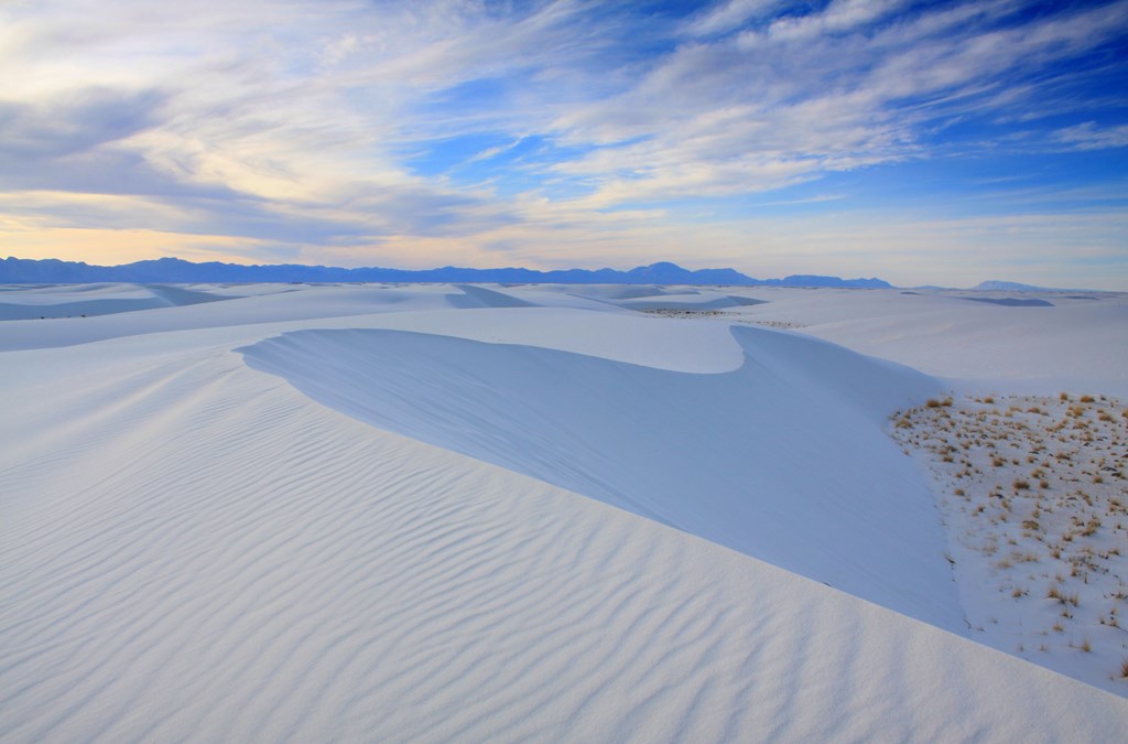 Ripples in soft white sand dunes at White Sands National Monument in New Mexico.