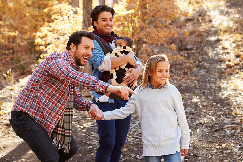  Couple With Children Walking Through Fall Woodland