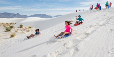 Sledding at White Sands National Park