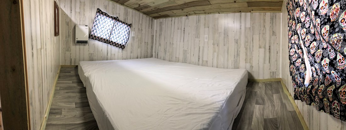 K9- the upstairs loft has a full size mattress and a twin size mattress lying on the floor. Bring your linens and be prepared to hear giggles all night! ??