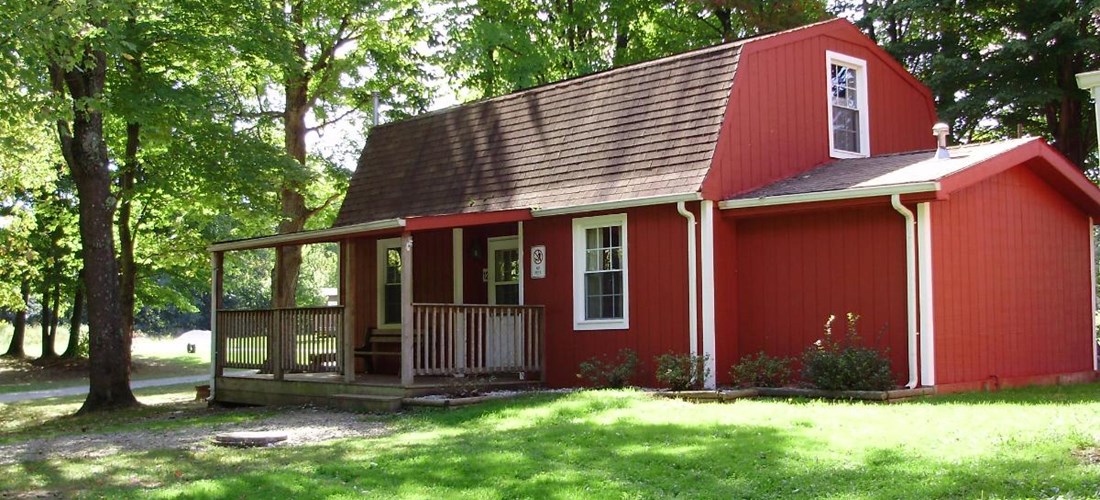 A Perfect choice to enjoy a short get away or a weeks’ vacation. Specialty Barns style kottages have a full-size furnished kitchen, full-size bathroom, and spacious living room.  One bedroom with a queen size bed, and a sleeping loft.  These Kottages are a short walk to the creek and come with a fire ring and picnic table.