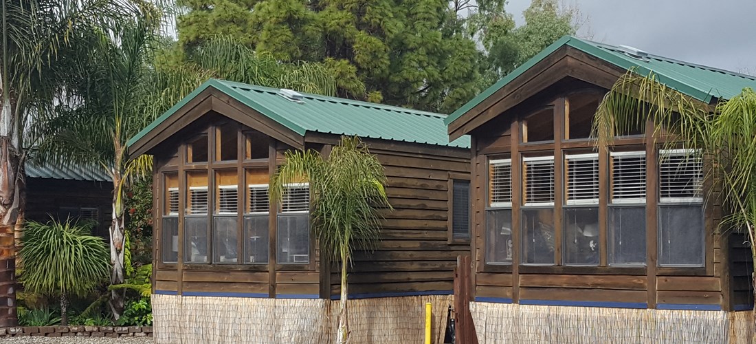 Studio cabins back up to our heated pool and spa