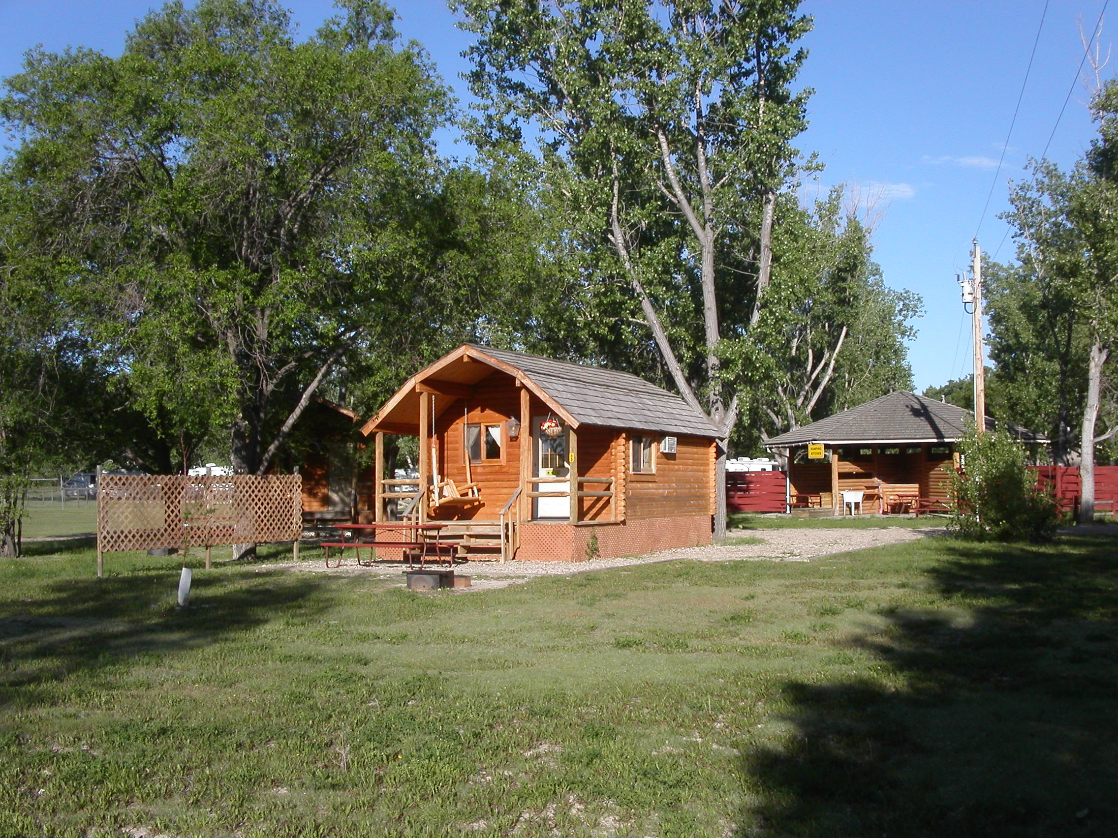 Deluxe Cabin Sleeps 4 no patio 83 Deluxe Tent behind