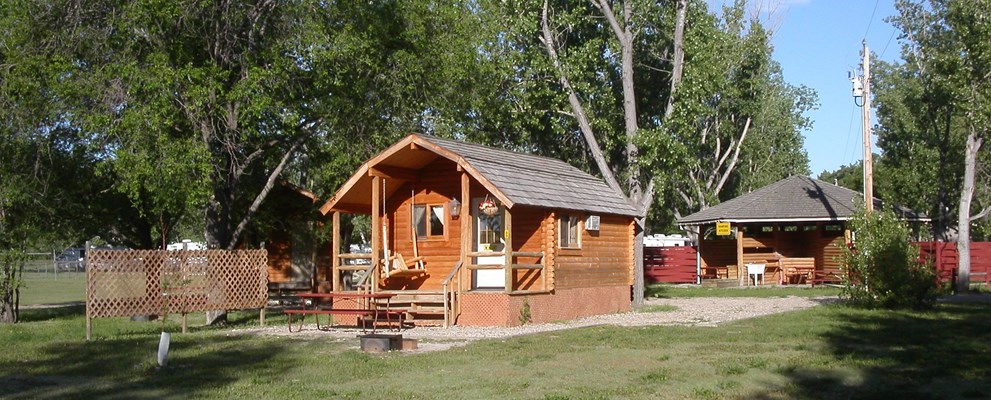 Deluxe Cabin Sleeps 4 no patio 83 Deluxe Tent behind