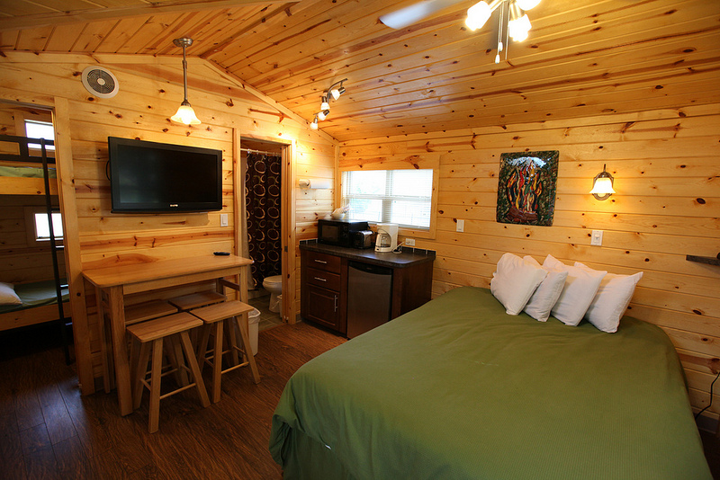 Our studio cabins have great main rooms with a queen bed.