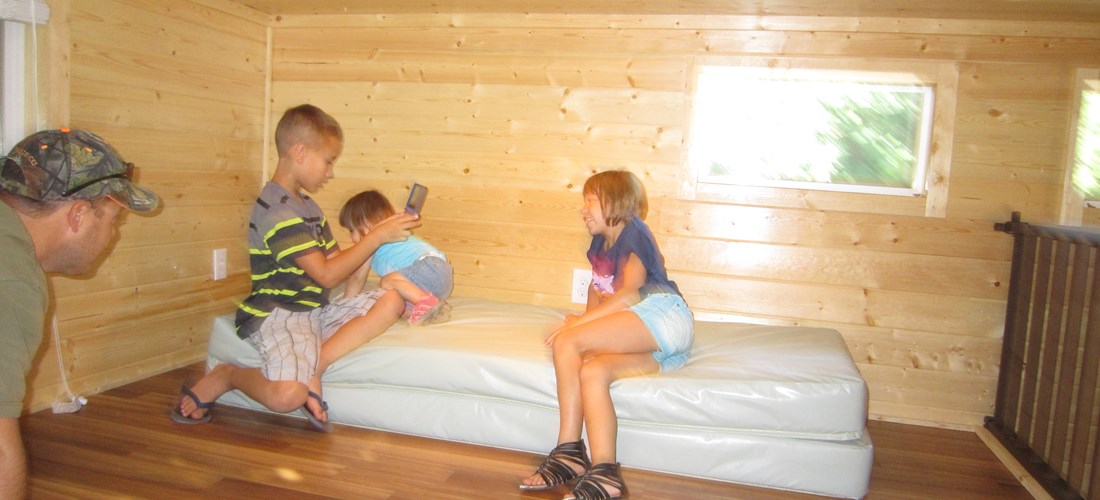 The sleeping loft is perfect for kids.