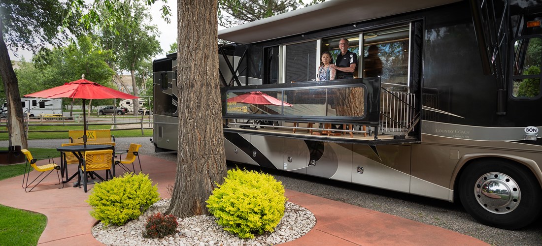 Our deluxe patio full hook up sites (1-12). are larger and more spacious than our basic pull thru full hook up sites.  They are a great option for RVs sporting slideouts,  families who desire extra space, and pet owners who want to give their furry friends more area to roam.