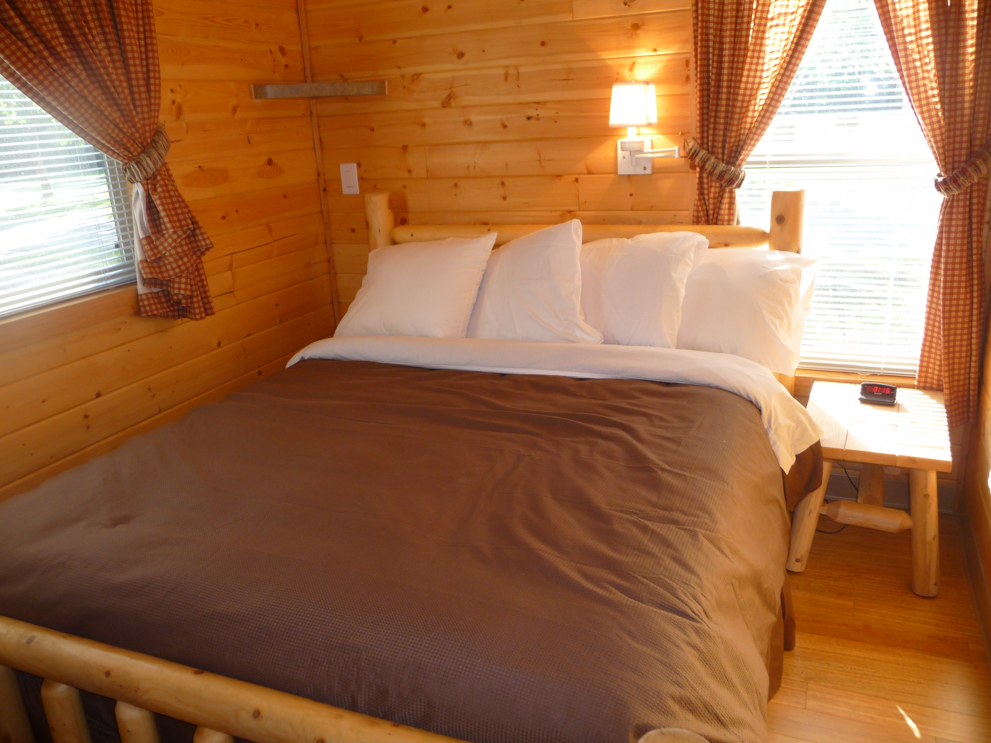Cabin has a private bedroom with queen bed.