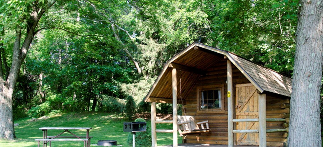 Enjoy the outdoors while staying in a Camping Cabin.