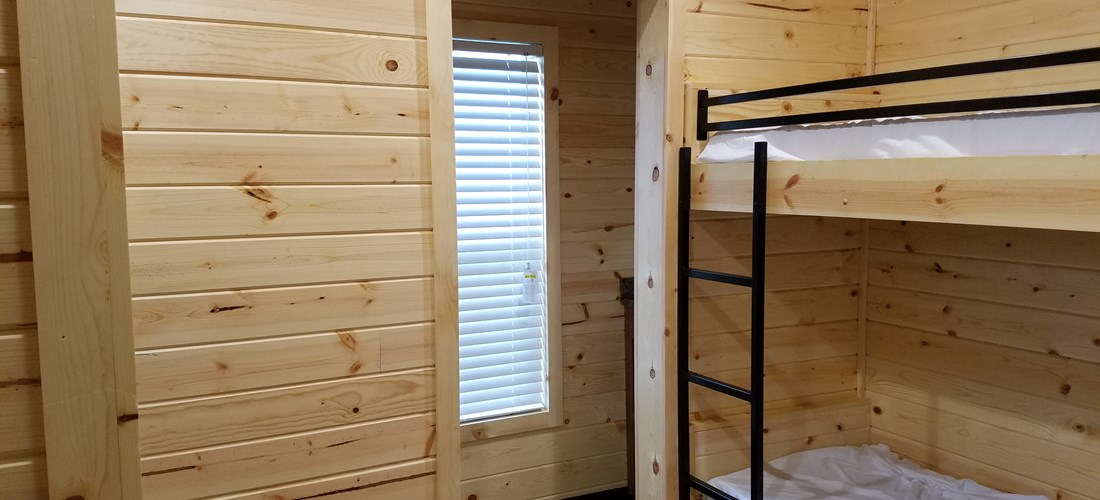Bunk Room with Entrance to 1/2 Bath
