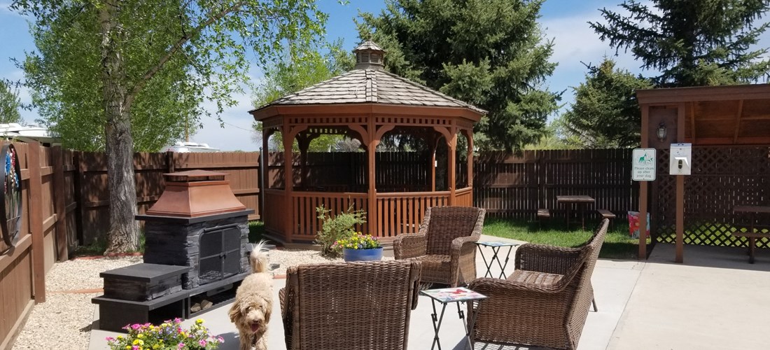 Very Large Fenced Deluxe Patio with Fire Place, Gazebo, multiple seating areas, etc.