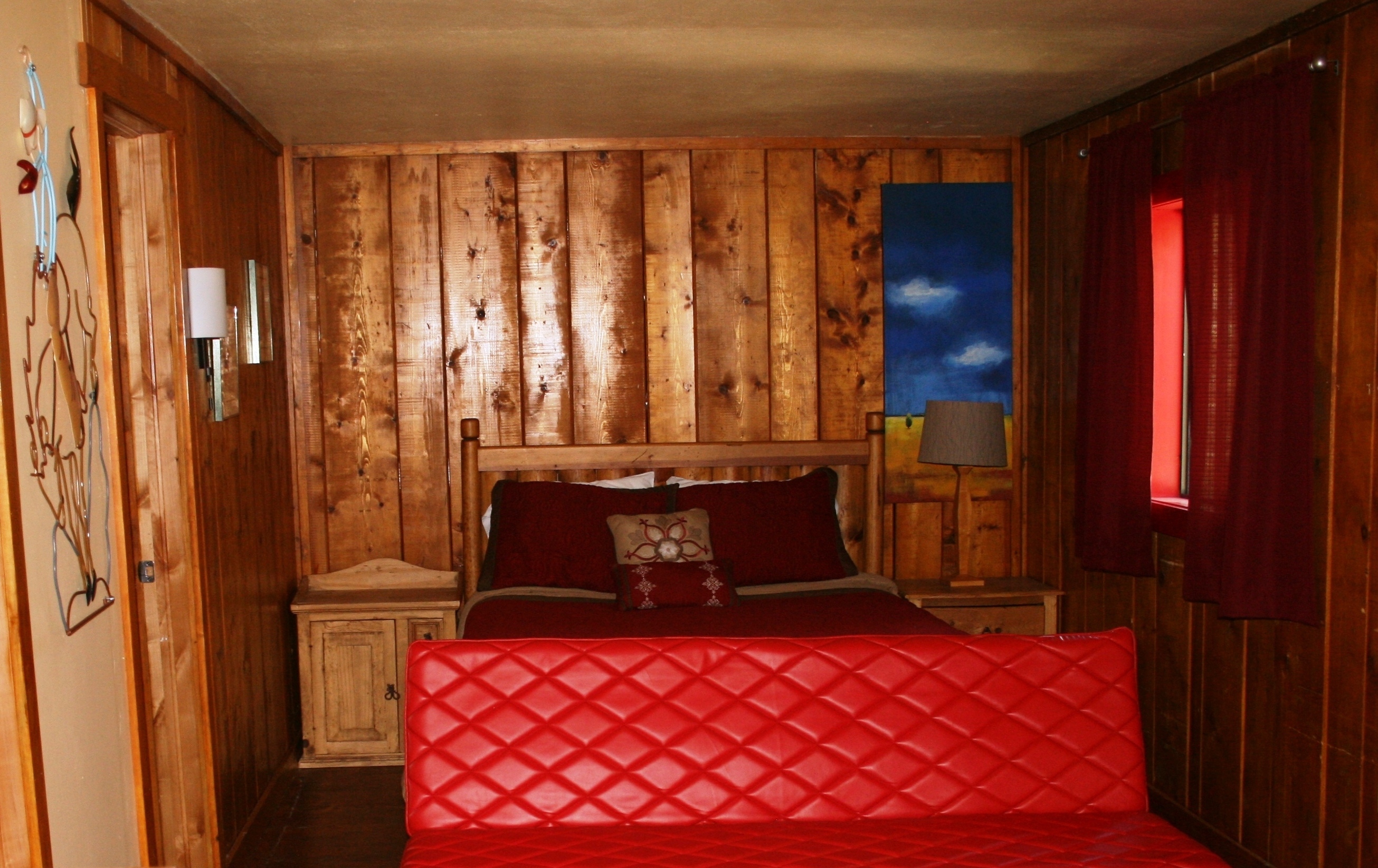 Main room with queen bed and futon