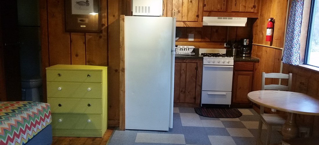 Table for two & full kitchen