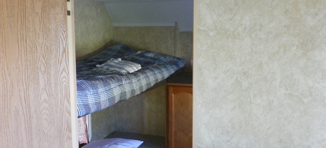 Rental trailer 150 bunk bed. Bedding & pillows are not provided.