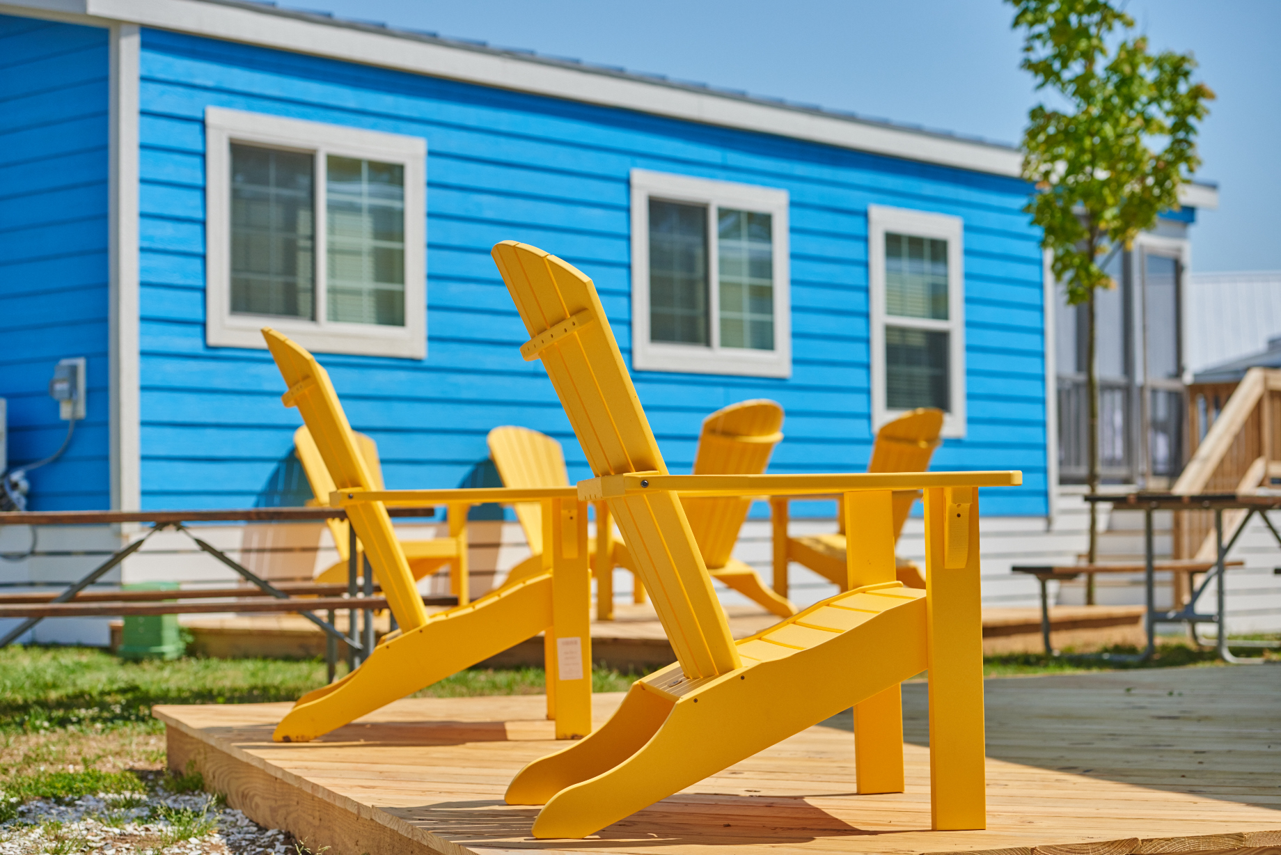 Chesapeake Bay KOA cabins come with private seating areas.