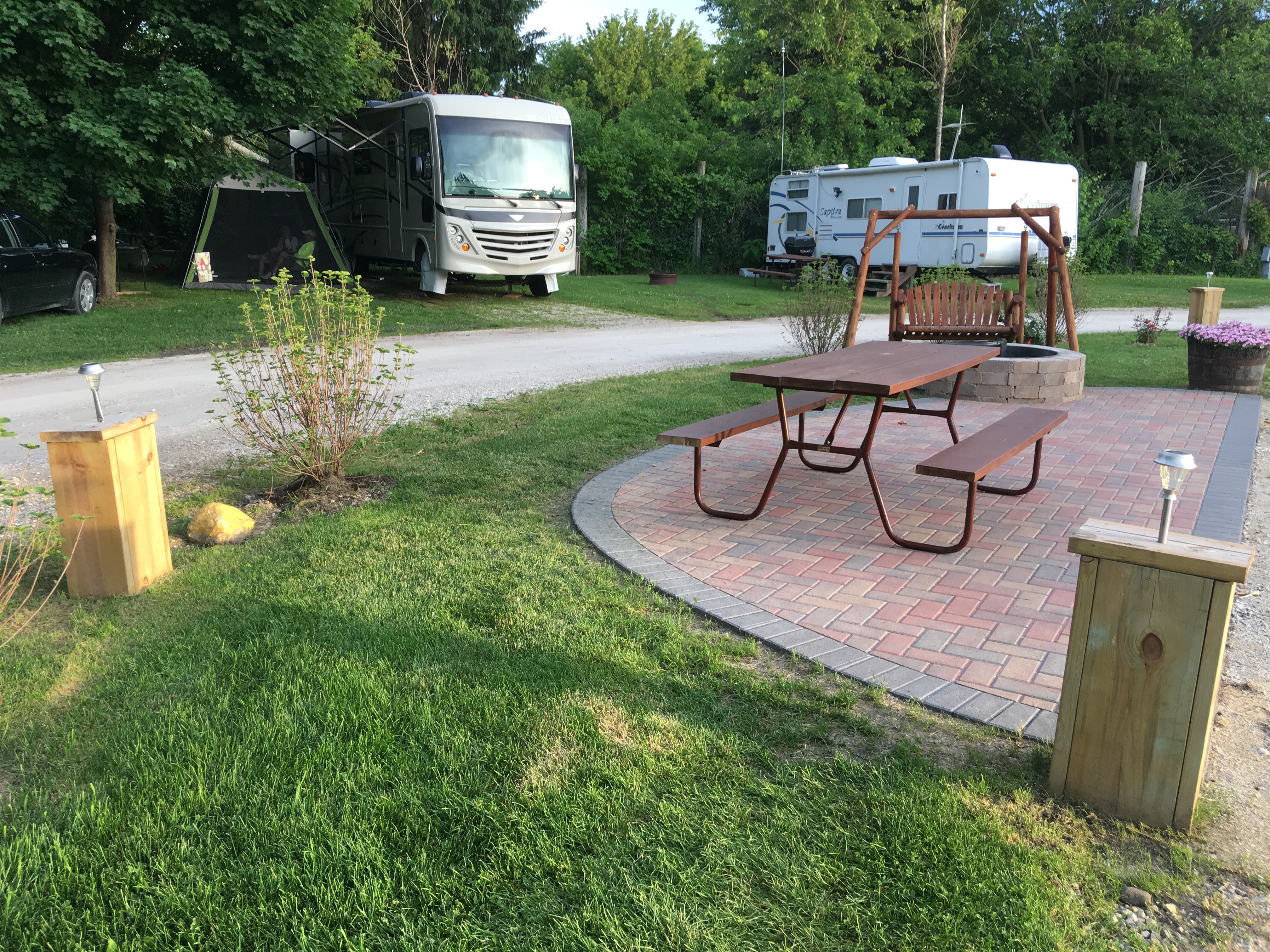 Pull Thru, 50/30 Amps, Full Hookups, KOA Patio ® Sites with a Swing and