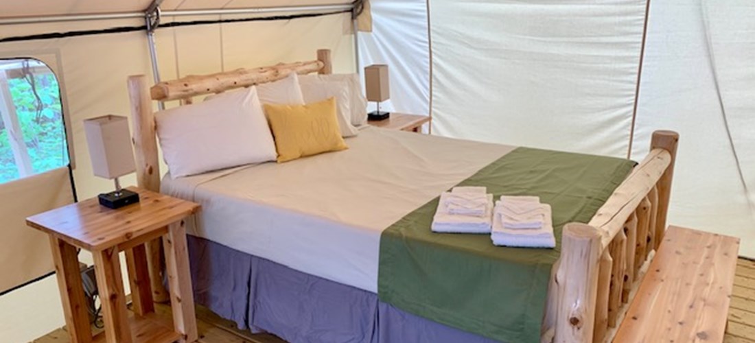 Luxury "Glamping" Tent queen bed with (shown with linen package)
