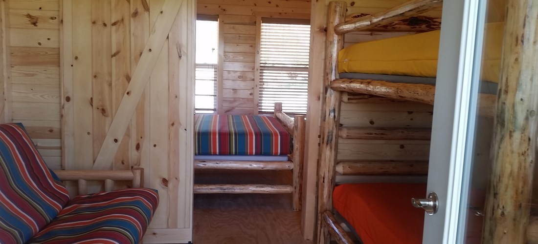 2 Room Camping Cabin, sleeps 6! Just bring your sleeping bags.