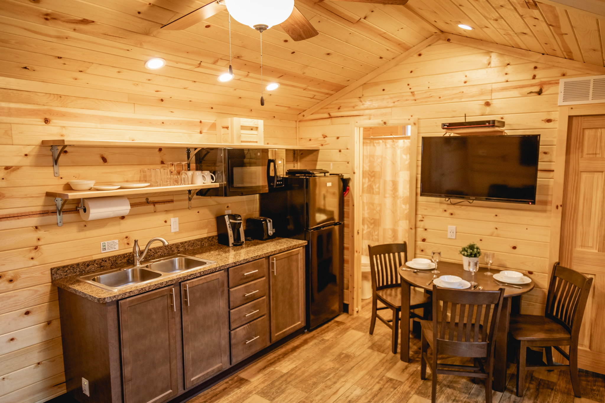 Kitchen - Coshocton KOA Deluxe Cabin in the Woods