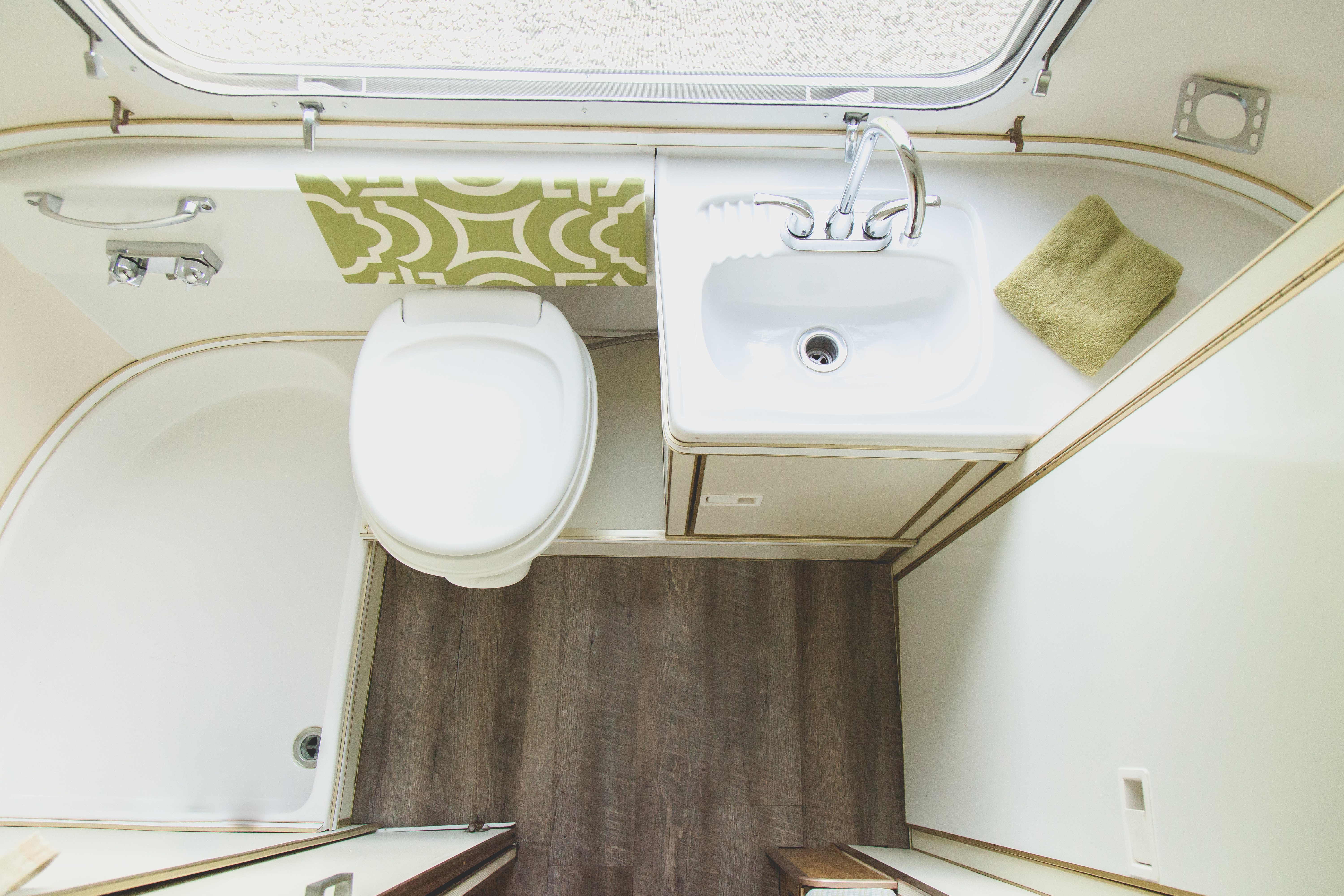 The Argosy 24 features a half bath.