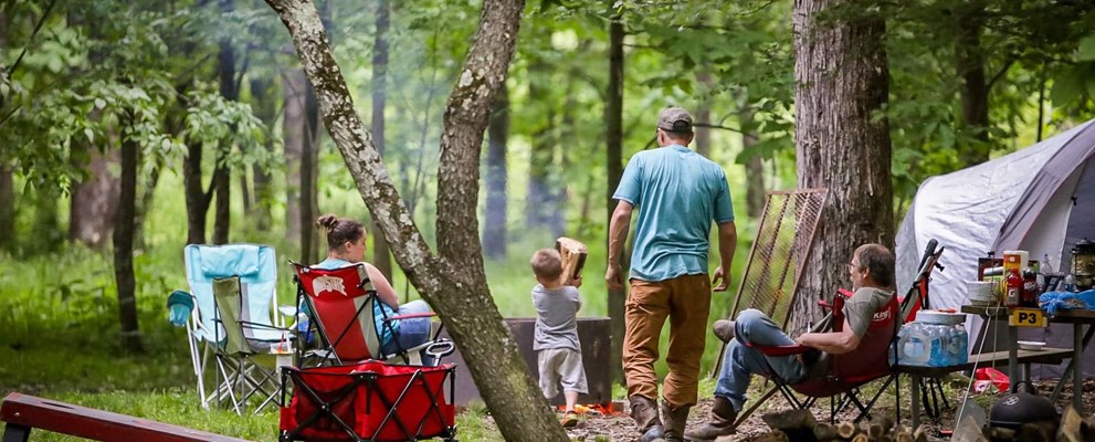 Back to basics woodland tenting is where family tradition begins.