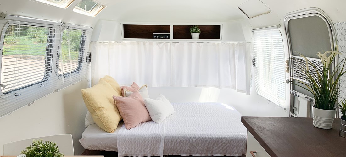 Argosy 30 living room area converted into a sleeping space.