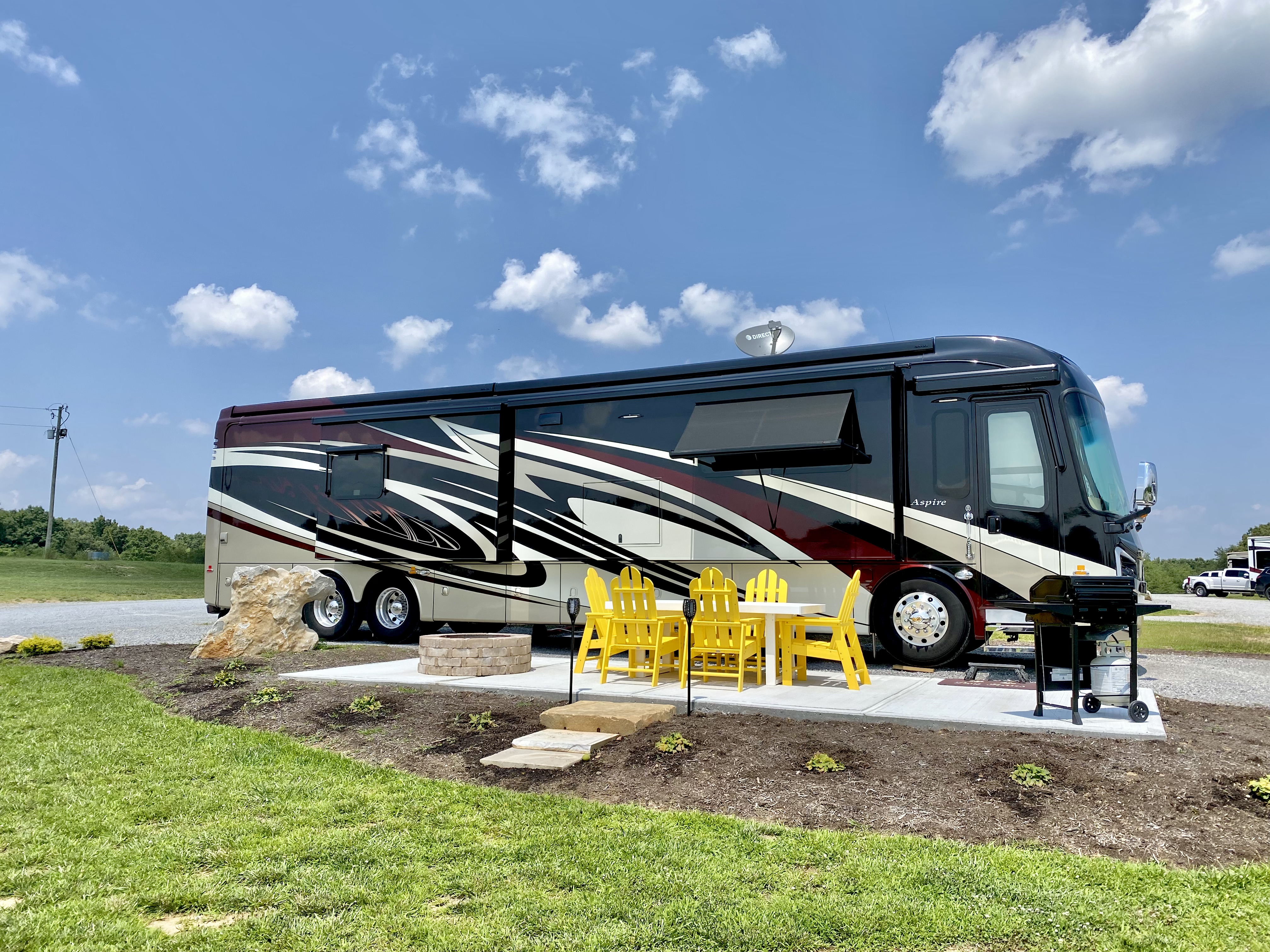 Pull Thru, 50/30/20 Amps, Full Hookups, KOA Patio ® Pictures