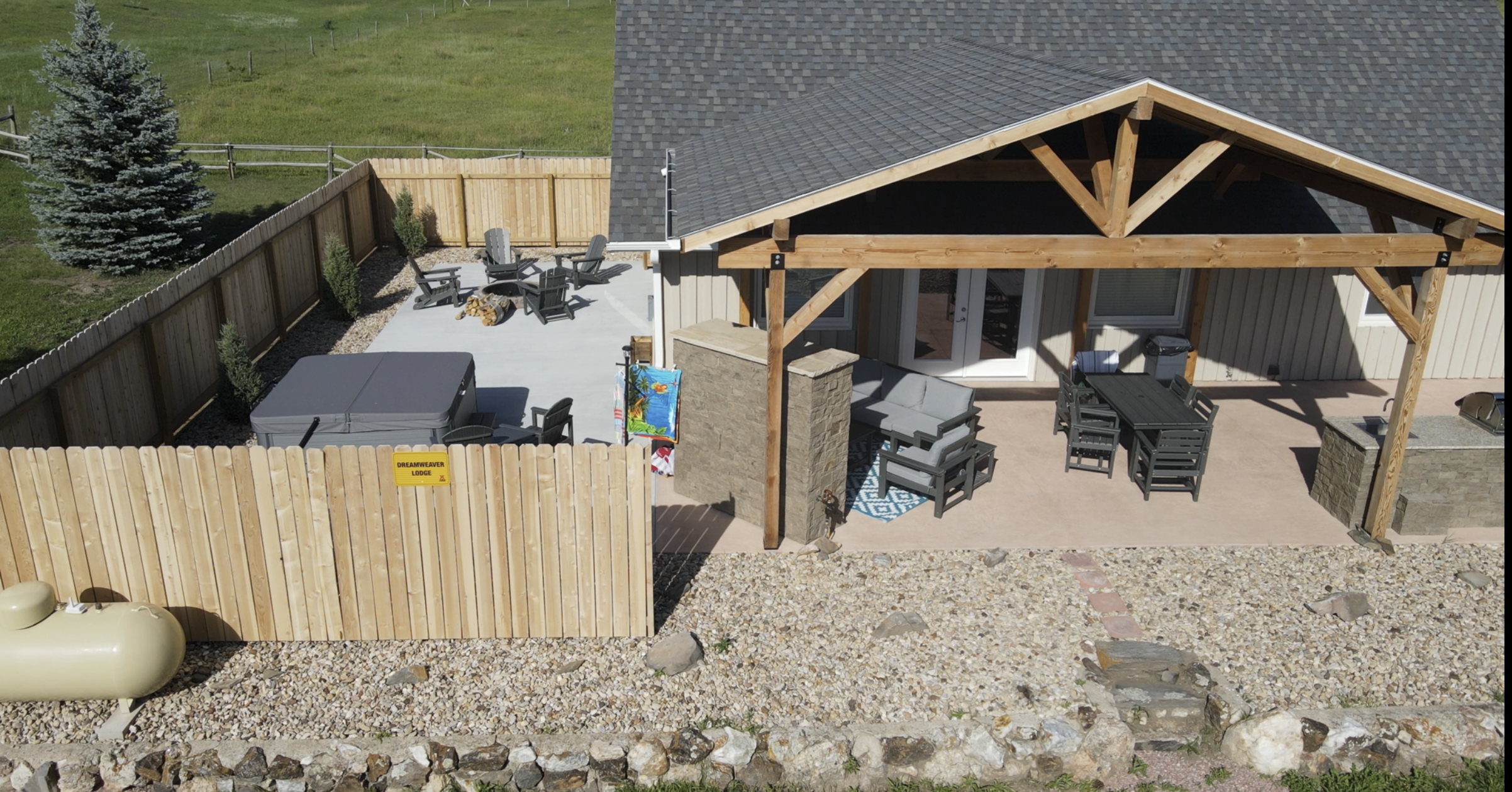Enjoy the outdoors with fireplace, spa, fire pit, and kitch