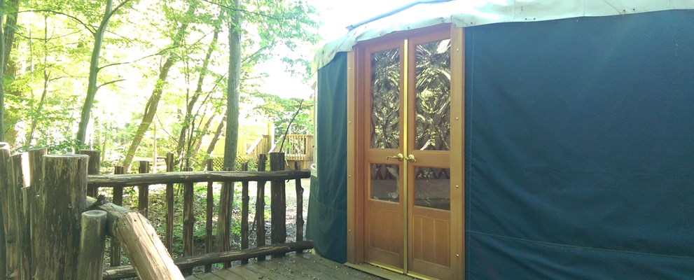 Bluegills Riverside Yurt: Photo features the back deck of the yurt.
