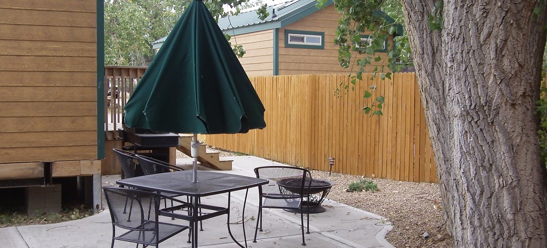 Our Deluxe Lodges have nice private patios with fire ring and gas BBQ Grill table and chairs for our guests