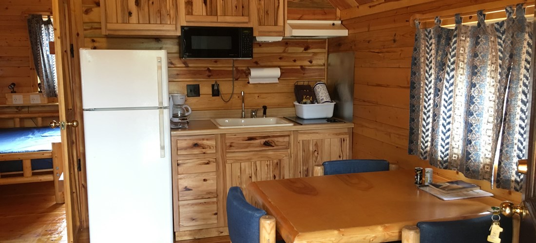 Deluxe Cabin Kitchen and Table
