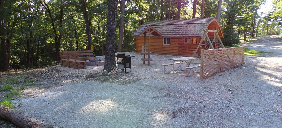 2 Room cabin patio and parking area
