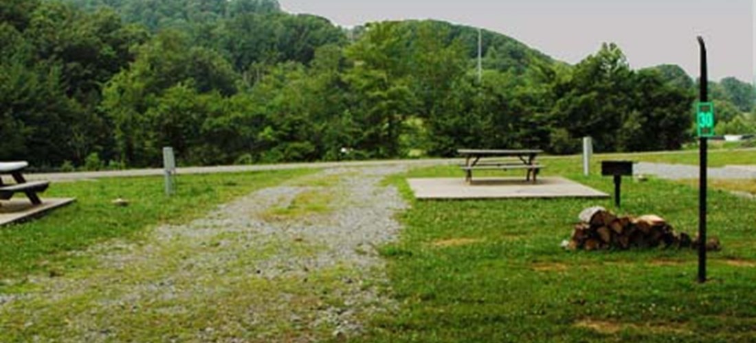 This is a pull-through site in the Ball Field section of our campground.   It is a great place for those who like to relax in a nice excluded spot.  Facing a ball field and the sun's setting point, the spots are great for those who  favor sports and great views