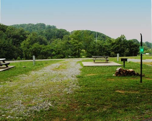 This is a pull-through site in the Ball Field section of our campground.   It is a great place for those who like to relax in a nice excluded spot.  Facing a ball field and the sun's setting point, the spots are great for those who  favor sports and great views