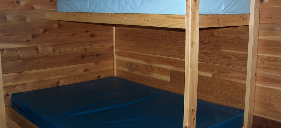 Double bed with upper bunk